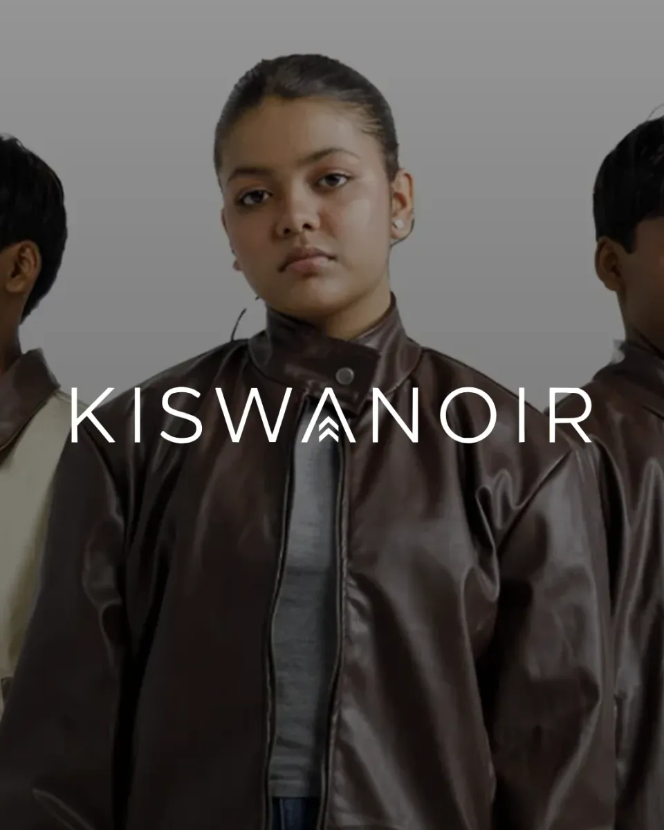 Kiswa Noir, the wordmark over three models in leather jackets